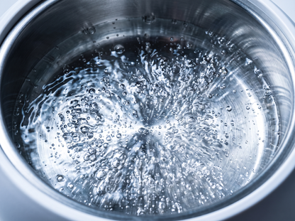 Tablet dissolving into cavitation bubbles inside the tank